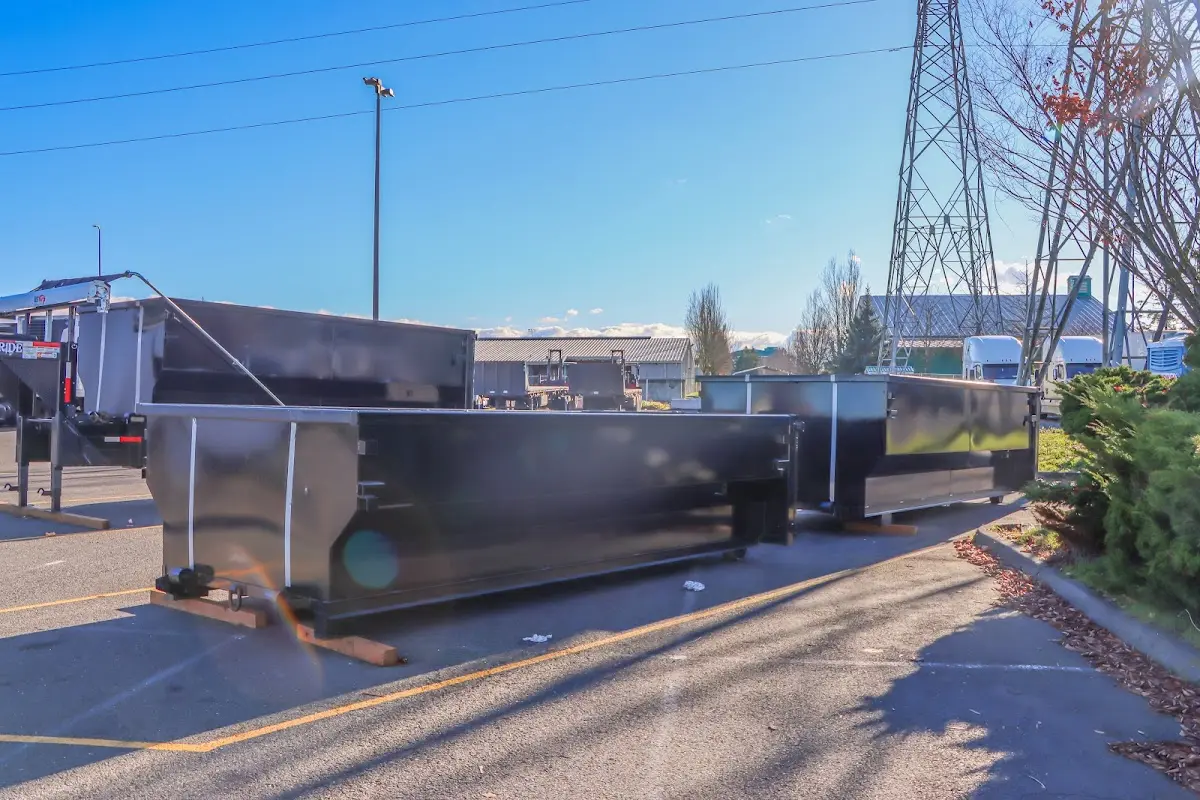 Roll-off dumpster ready for waste disposal at job site for Concrete Dumpster Rental in Simpsonville
